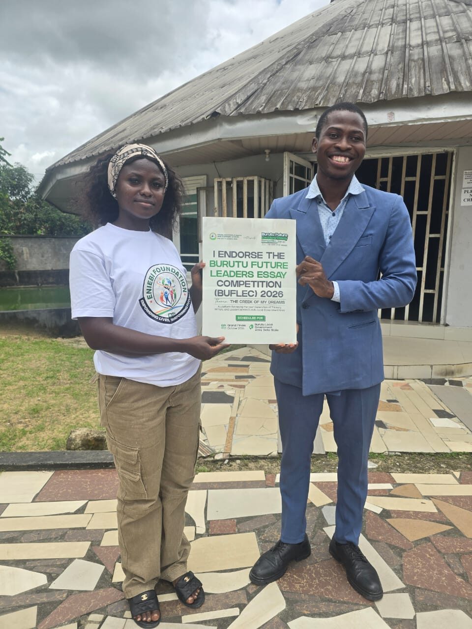 Eniebi Foundation representative holding a BUFLEC 2026 endorsement plaque